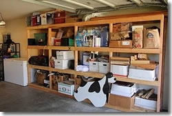 Garage-Shelving bins, boxes, and drawers well organized in garage Shelve.