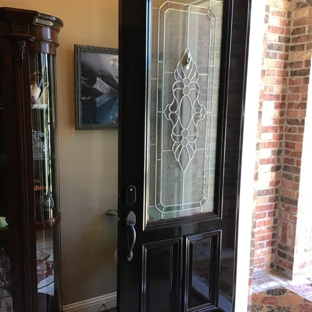 New door with stained glass accent installation.