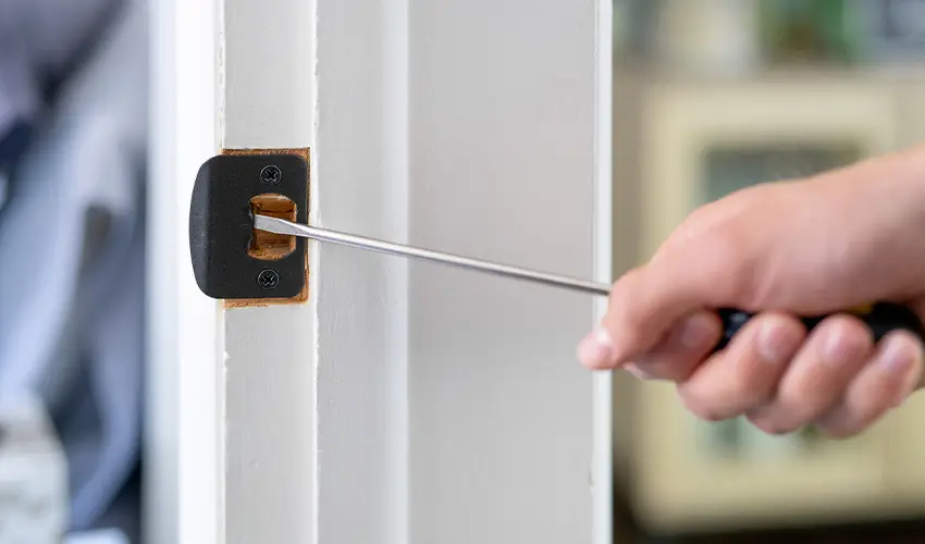 How to Fix a Loose Door Latch So Your Door Doesn't Shake