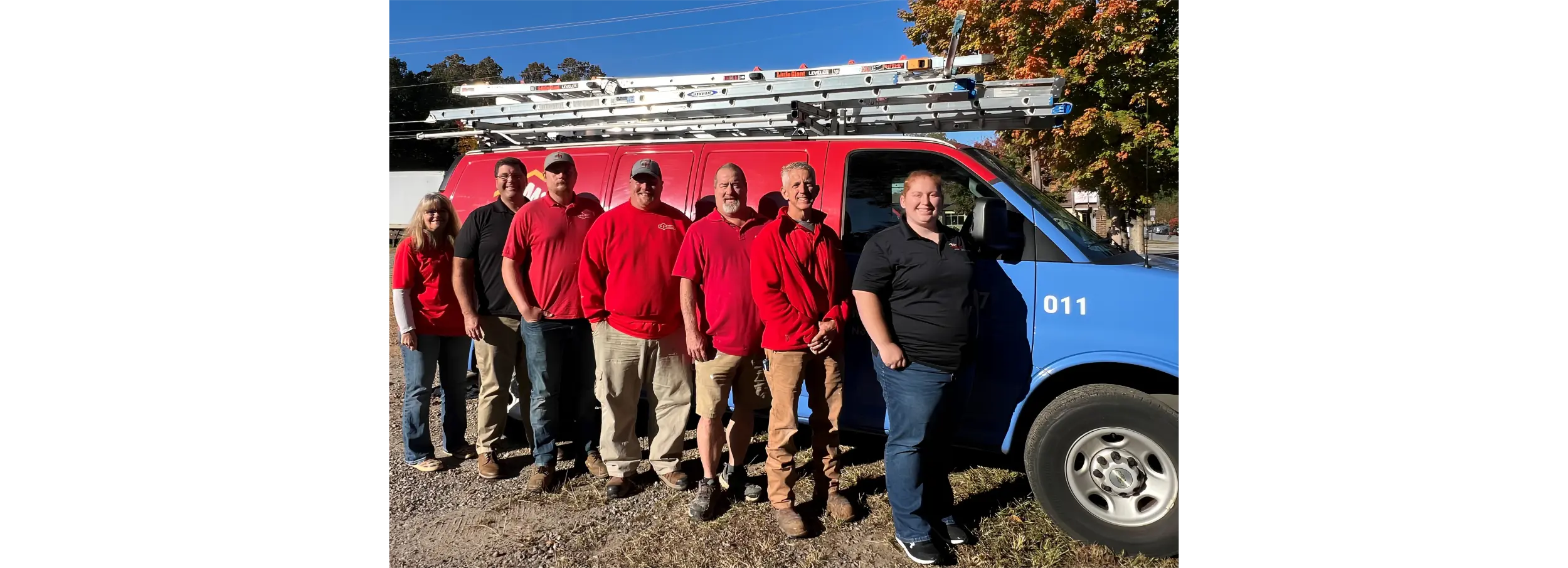 MRH technicians in front of van.