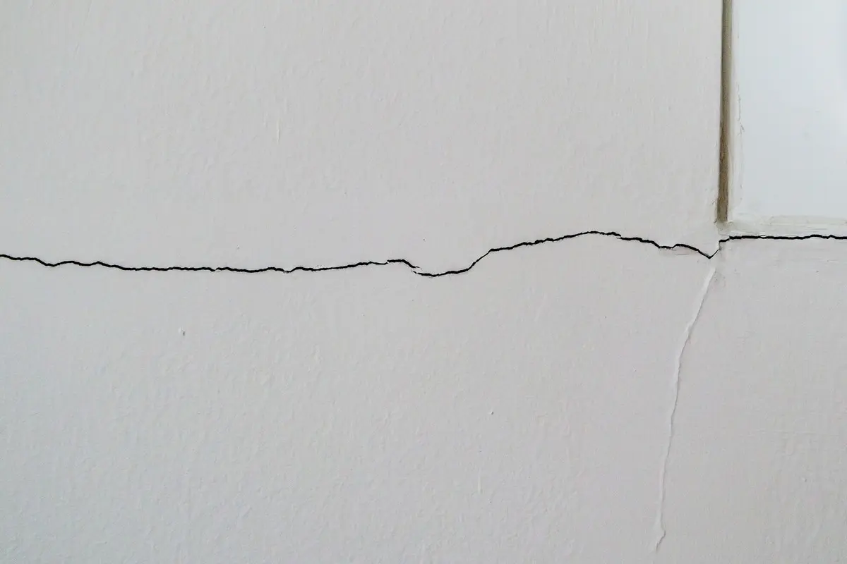 Drywall crack before drywall repair in Derby, KS by Mr. Handyman